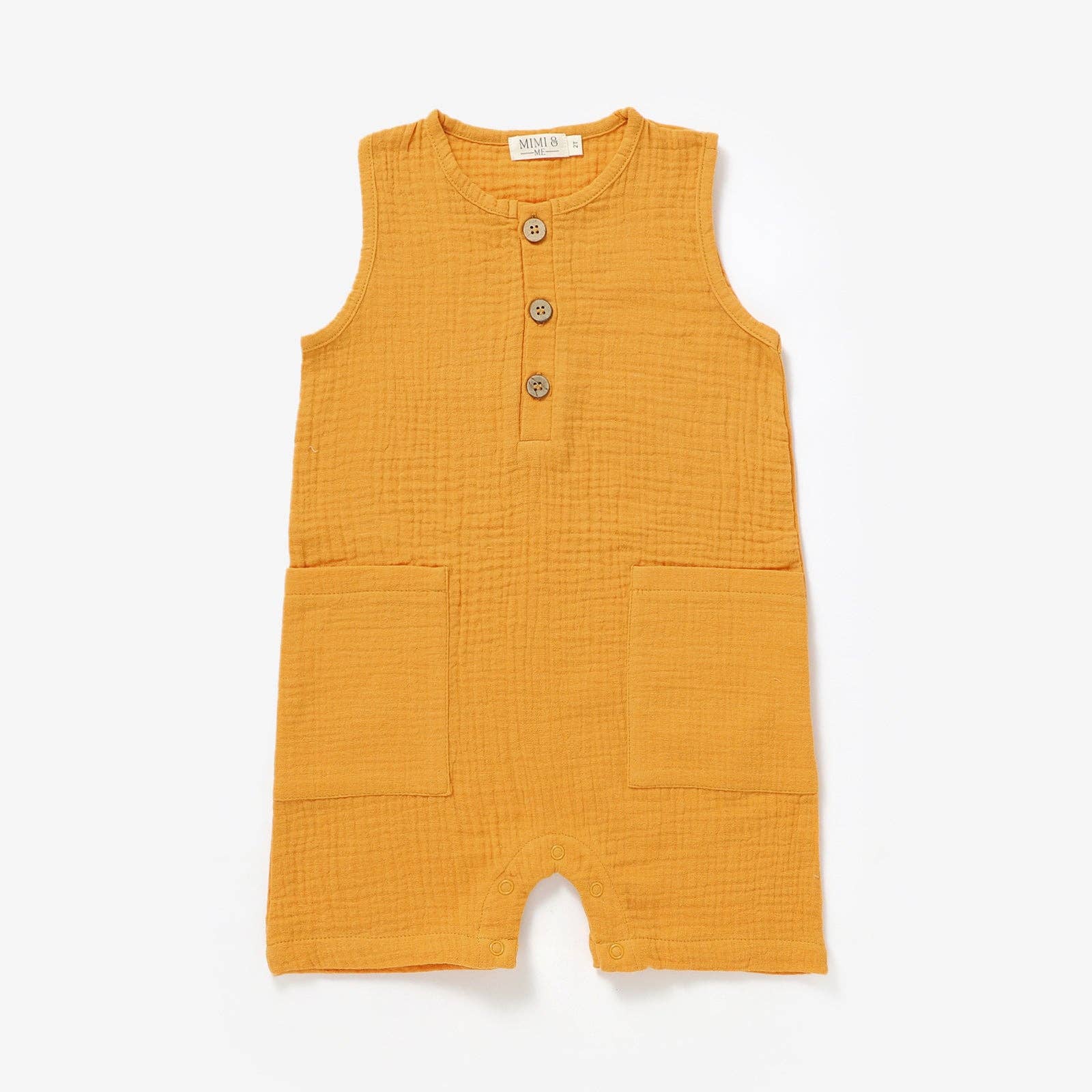 Sleeveless organic gender neutral muslin romper in Marigold